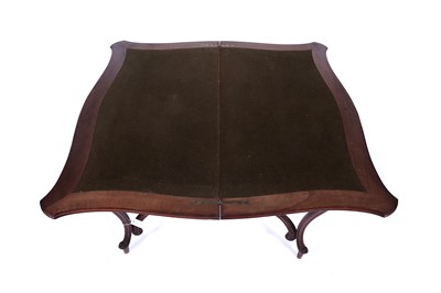 Lot 24 - A late 19th Century continental walnut games table