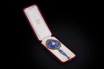 Lot 333 - A late 19th Century French silvergilt mounted enamel hand mirror