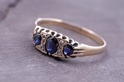 Lot 105 - An Edwardian-style sapphire and diamond ring