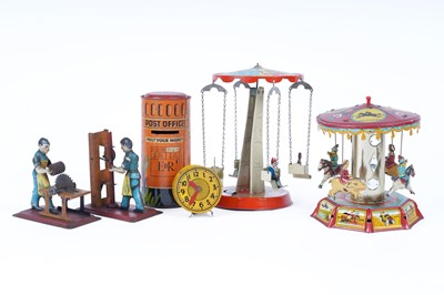 Lot 577 - Two early 20th Century Arnold style tin plate figures of workmen; and other items