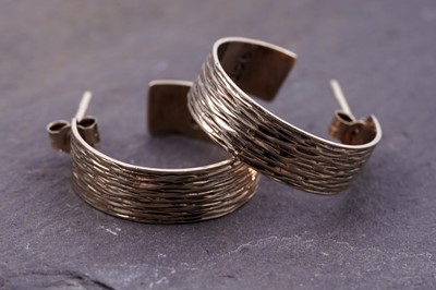 Lot 52 - A pair of 20th Century 9ct gold half hoop earrings
