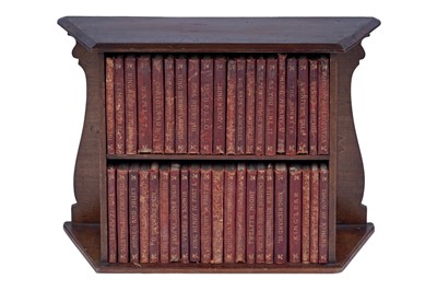 Lot 135 - A miniature bookcase containing works by Shakespeare