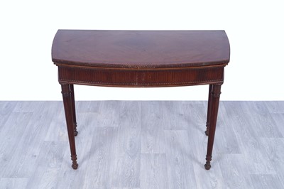 Lot 4 - A 19th Century-style fiddleback-mahogany and mahogany games table