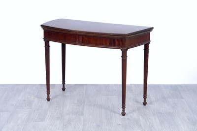 Lot 4 - A 19th Century-style fiddleback-mahogany and mahogany games table