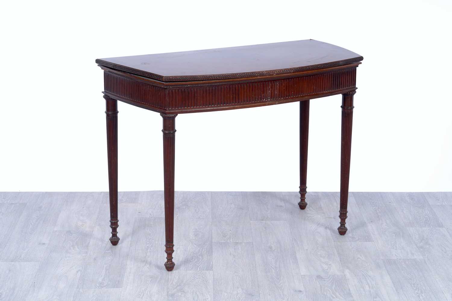 Lot 4 - A 19th Century-style fiddleback-mahogany and mahogany games table