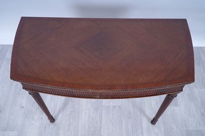 Lot 4 - A 19th Century-style fiddleback-mahogany and mahogany games table