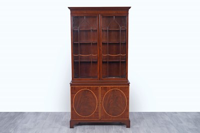 Lot 5 - Bevan Funnell: a Georgian style inlaid mahogany and satinwood banded bookcase