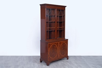 Lot 5 - Bevan Funnell: a Georgian style inlaid mahogany and satinwood banded bookcase