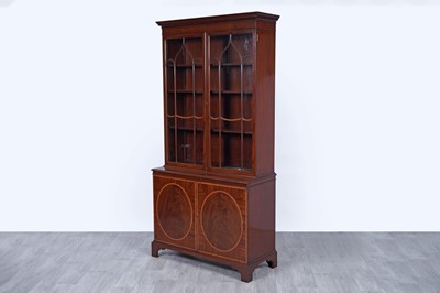 Lot 5 - Bevan Funnell: a Georgian style inlaid mahogany and satinwood banded bookcase