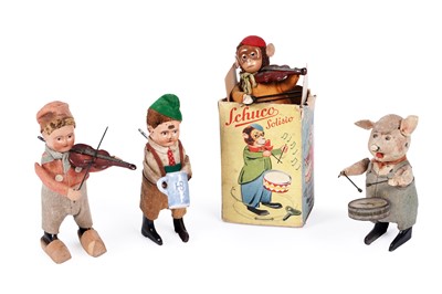 Lot 584 - Four clockwork Schuco figures