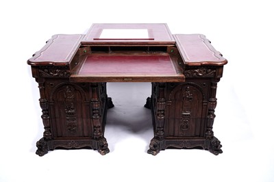 Lot 616 - A 19th Century Northern European carved oak pedestal desk