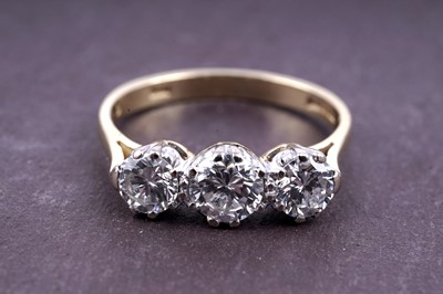 Lot 503 - A three stone diamond ring