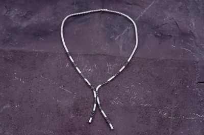 Lot 504 - A white and black diamond necklace