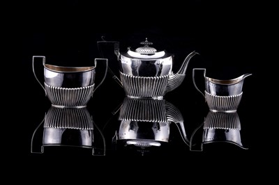 Lot 243 - A Victorian three-piece tea service | 1898