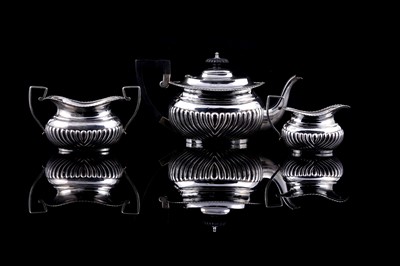 Lot 244 - A Victorian three-piece tea service | Chester 1899