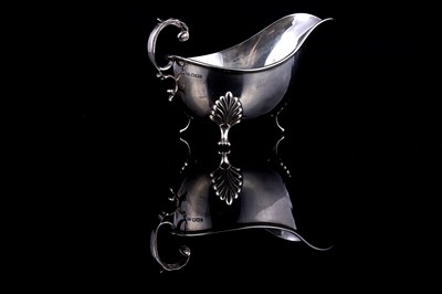 Lot 245 - A Victorian silver sauce boat