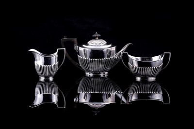 Lot 247 - An Edwardian silver three-piece tea service