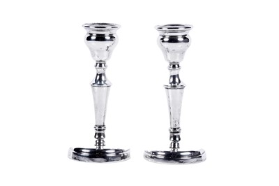 Lot 356 - A pair of early George V silver candlestick holders | London 1912