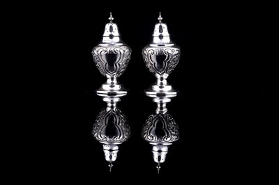 Lot 219 - A cased pair of Victorian silver pepperettes
