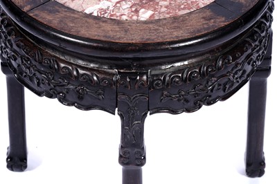 Lot 340 - A late 19th/early 20th Century Chinese carved hardwood jardiniere stand