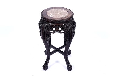 Lot 341 - A late 19th/early 20th Century Chinese carved hardwood jardiniere stand
