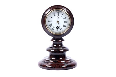 Lot 571 - A late 19th Century red and black marble timepiece