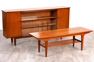 Lot 35 - A mid-20th Century teak cabinet; and a teak coffee table
