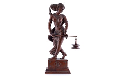 Lot 245 - An Indian carved hardwood figure of a Goddess