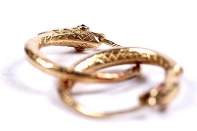 Lot 112 - A pair of 19th Century ouroboros pattern earrings