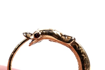 Lot 112 - A pair of 19th Century ouroboros pattern earrings
