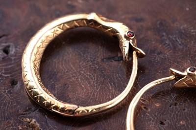 Lot 112 - A pair of 19th Century ouroboros pattern earrings