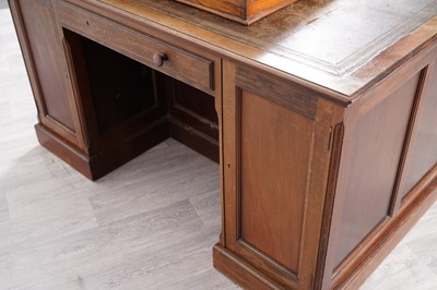 Lot 36 - A Victorian mahogany partner's kneehole pedestal desk; and a writing slope