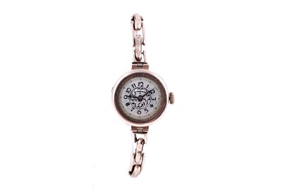 Lot 184 - A 1920s lady's 9ct rose gold wristwatch, with champleve enamelled face