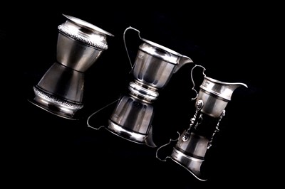 Lot 221 - An Edwardian silver miniature planter; and two silver jugs