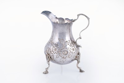 Lot 81 - An early George III silver cream jug