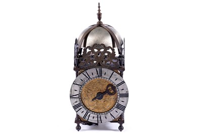 Lot 582 - A 17th Century style brass lantern clock