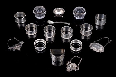 Lot 224 - Silver and silverplate napkin rings, cruets, and bottle labels