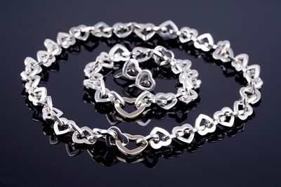Lot 507 - Tiffany & Co: a silver and gold demi-parure