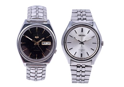 Lot 156 - A Seiko stainless-steel dress watch; and a Seko 5 stainless-steel sports watch with black dial