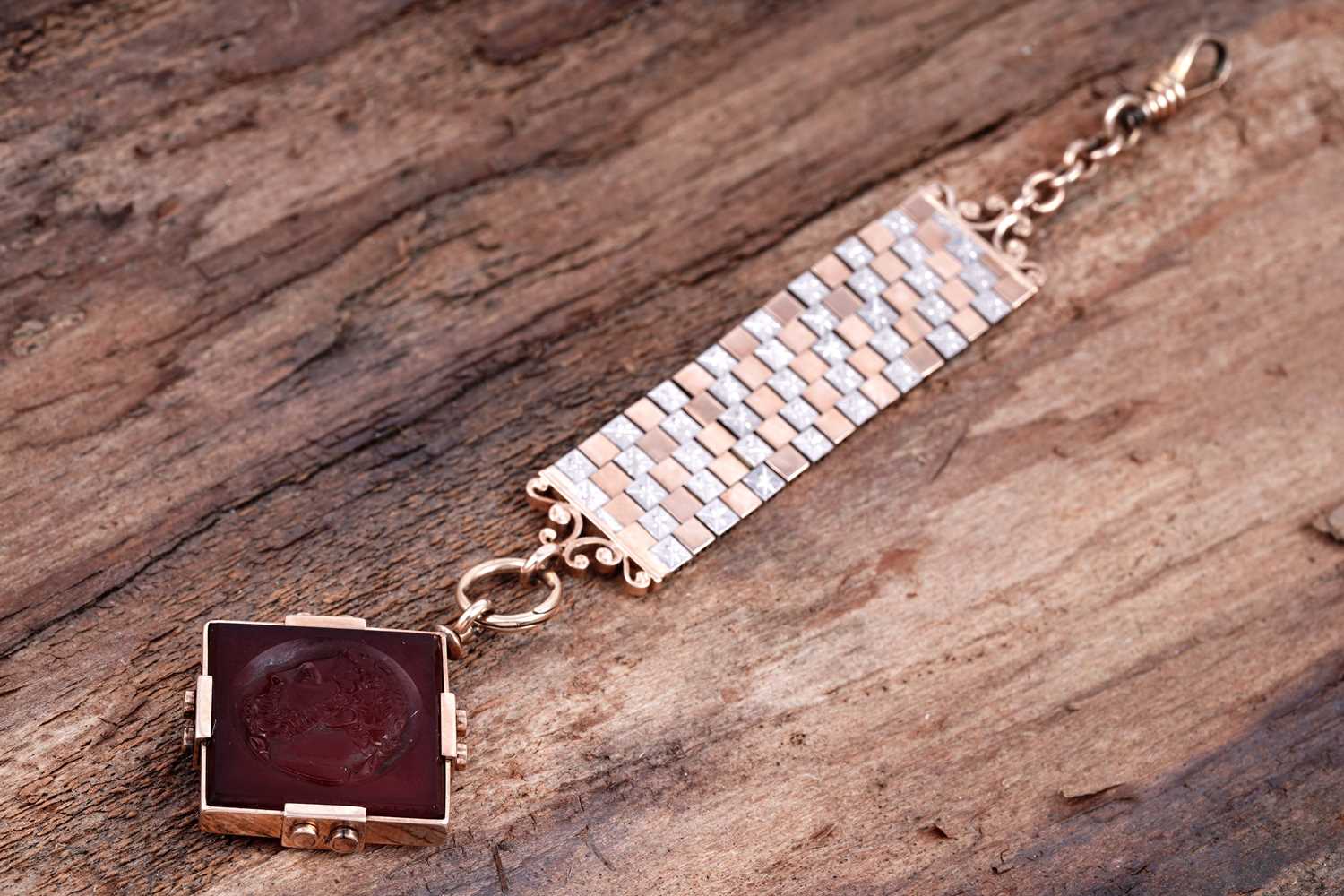 Lot 509 - A late 19th Century carved carnelian fob on mount