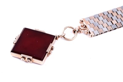 Lot 509 - A late 19th Century carved carnelian fob on mount