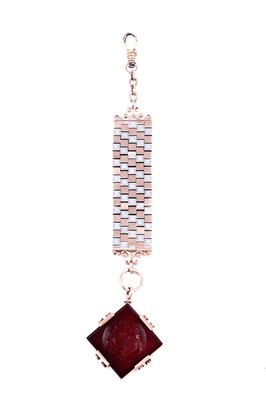 Lot 509 - A late 19th Century carved carnelian fob on mount