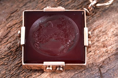 Lot 509 - A late 19th Century carved carnelian fob on mount