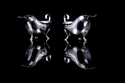 Lot 209 - Two George V silver sauce boats