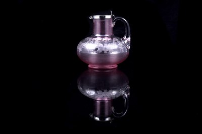 Lot 258 - A Victorian silver mounted cut glass claret jug