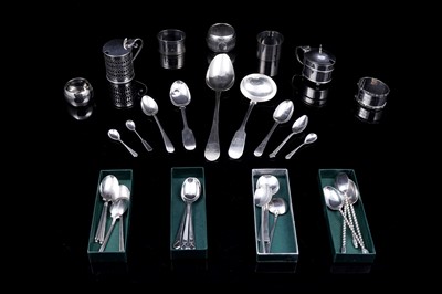 Lot 205 - Georgian and later silver flatware and napkin rings, including a Newcastle fiddle-pattern ladle