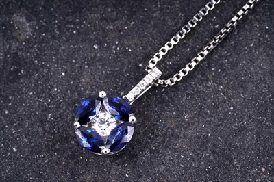 Lot 510 - A sapphire and diamond pendant