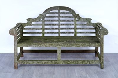 Lot 264 - A teak-framed garden bench