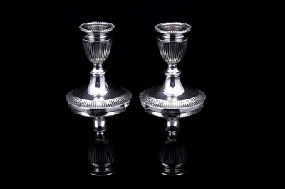 Lot 260 - A pair of Victorian silver candlestick holders