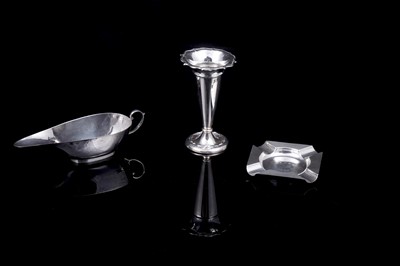Lot 223 - Art Deco silver items, including a streamline sauce boat